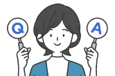 Q&Aの札を持つ女性